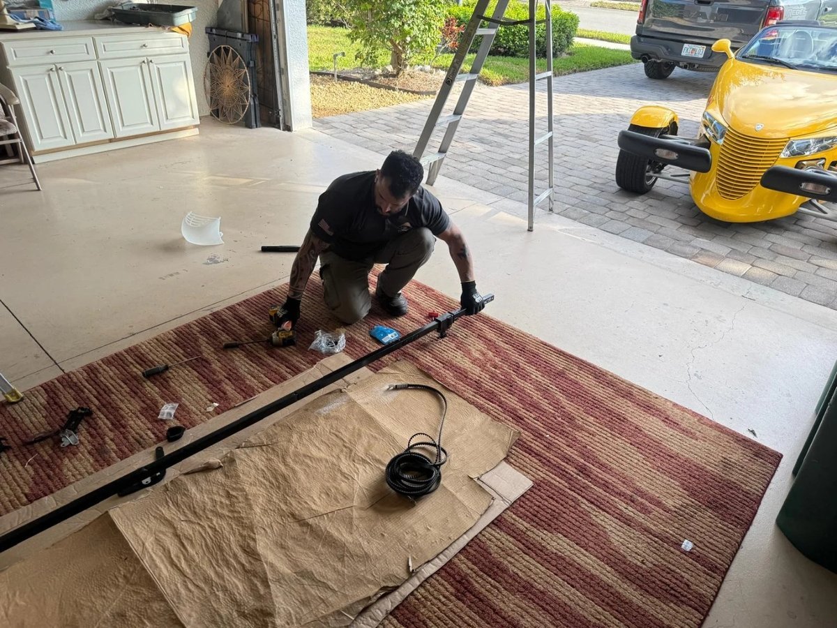 A Legacy Emerald Coast technician on a job in Santa Rosa Beach